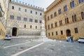 Piazza Salimbeni is square with Statue of Sallustio Bandini in old town Siena. Tuscany, Italy Royalty Free Stock Photo