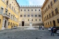 Piazza Salimbeni is square with Statue of Sallustio Bandini in old town Siena. Tuscany, Italy Royalty Free Stock Photo