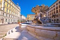 Piazza Vittorio Veneto square and fountain in city of Trieste Royalty Free Stock Photo