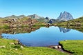 Pic du Midi d Ossau reflecting in Anayet lake, Spanish Pyrenees, Aragon, Spain Royalty Free Stock Photo