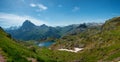 Pic du Midi Ossau and Ayous lake in the french Pyrenees mountains Royalty Free Stock Photo