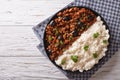 Picadillo a la habanera with rice on the table. Horizontal top v