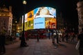 Piccadilly Circus square at night in London, England, UK Royalty Free Stock Photo