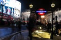 PICCADILLY, LONDON, ENGLAND- 14 November 2021: Piccadilly Circus London Underground station entrance next to Piccadilly Lights Royalty Free Stock Photo