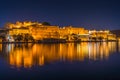 Pichola lake and Udaipur City Palace at night. Royalty Free Stock Photo