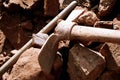 Pick axe and rocks Royalty Free Stock Photo
