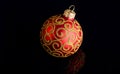 Pick decor for christmas tree. Christmas ornament single red ball on black background. Christmas ornament concept Royalty Free Stock Photo