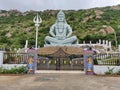 Full view of Lord shiva statue surrounded by hills at Panukonda fort in Anantapur Andhra Pradesh India Royalty Free Stock Photo