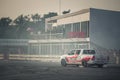 Pick-up car perform burnout tire on the track Royalty Free Stock Photo