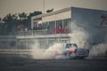 Pick-up car perform burnout tire on the track Royalty Free Stock Photo