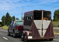 Pick-up truck hauling horse trailer Royalty Free Stock Photo