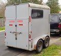 Horse trailer parked on neighborhood street Royalty Free Stock Photo