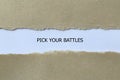 pick your battles on white paper Royalty Free Stock Photo