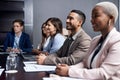 Pick your best move. a group of businesspeople having a meeting in a boardroom. Royalty Free Stock Photo