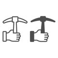 Pickaxe in hand line and solid icon, labour day concept, Tool for work with stone sign on white background, worker arm