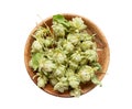Picked and dried herbal medicinal plant Humulus lupulus, the common hop or hops flowers. Hops flowers in bowl isolated on white .