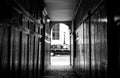 Pickering Place, London UK: narrow passageway leading to small square. At the far end taxi drives along St James Street.