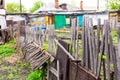 the picket fence has decayed and the old fence between the two sites has collapsed