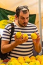 Picking a Citron Etrog for the Sukkot Holiday Royalty Free Stock Photo