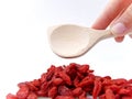 Picking Goji Berries with Spoon Royalty Free Stock Photo