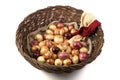 Picking onions of different varieties: yellow, red, pink, in a large basket on a bag, side view. Royalty Free Stock Photo