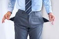 Picking out his pockets. a businessman standing with his pockets turned out. Royalty Free Stock Photo