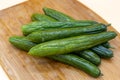 Pickle cucumbers on a cutting board Royalty Free Stock Photo