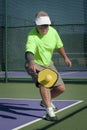 Pickleball Action - Senior Male Player Hitting Backhand