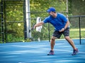 Pickleball Instructor demonstrates the backhand volley.tif Royalty Free Stock Photo