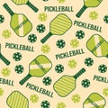 A pickleball vector pattern with a light beige background, striped rackets with the word Pickleball, and yellow balls Royalty Free Stock Photo