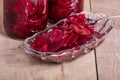 Pickled beets in jars and bowl