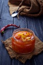 Pickled bulgarian peppers in a glass jar