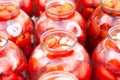 Pickled canned tomatoes in jars.fermentation of tomatoes