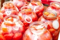 Pickled canned tomatoes in jars