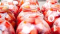 Pickled canned tomatoes in jars.salting process
