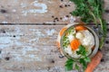 Pickled cauliflower with carrots in a glass jar on an old wooden table. Fermented food. Copy space. top view Royalty Free Stock Photo