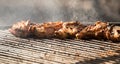 Pickled chicken fried on a large barbecue