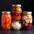 Pickled chopped vegetables in a glass jar on a graphite board background. Preparations for the winter