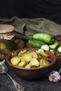 Pickled cucumber salad in a bowl and jar Royalty Free Stock Photo