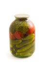 Pickled cucumber and tomato in glass jar Royalty Free Stock Photo