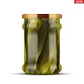 Pickled cucumbers in glass jar