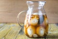 Pickled eggs in the glass jug