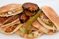 Pickled fried aubergine, green peppers, Traditional Egyptian breakfast street sandwiches of mashed fava beans, fried crispy