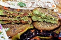 Pickled fried aubergine and green peppers, Traditional Egyptian popular breakfast street sandwiches of mashed fava beans, fried