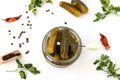 Pickled gherkins in a glass jar on a white background, top view Royalty Free Stock Photo