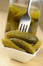 Pickled gherkins in a small bowl Royalty Free Stock Photo