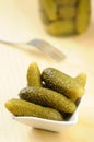 Pickled gherkins in a small bowl Royalty Free Stock Photo