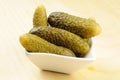 Pickled gherkins in a small bowl Royalty Free Stock Photo