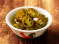 Pickled green chilies