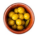 Pickled green olives with cucumber - typical Spanish tapas olivas verdes y pepinos